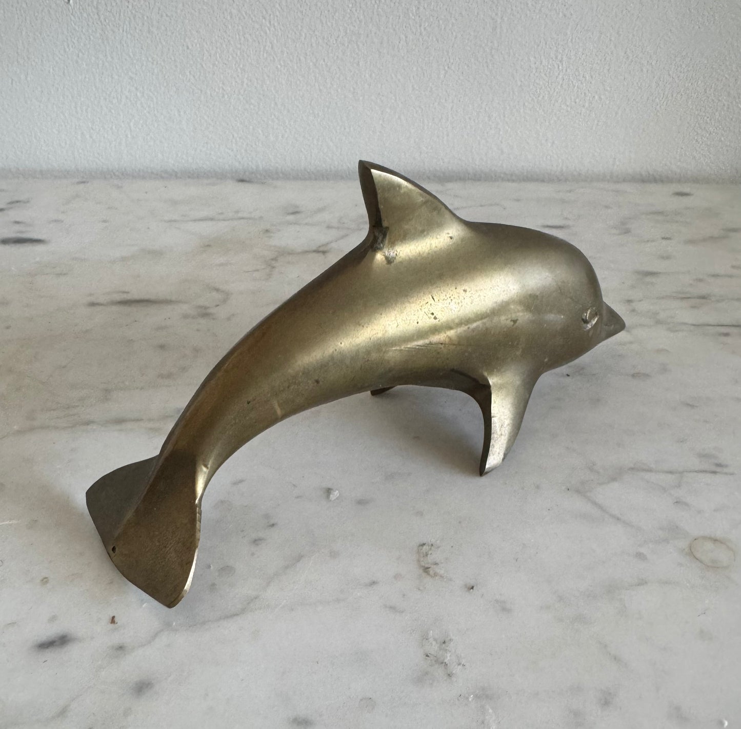 Vintage brass dolphin figurine