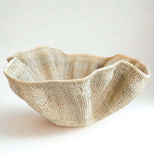 Dramatic Rippled Palm Leaf Dancing Basket