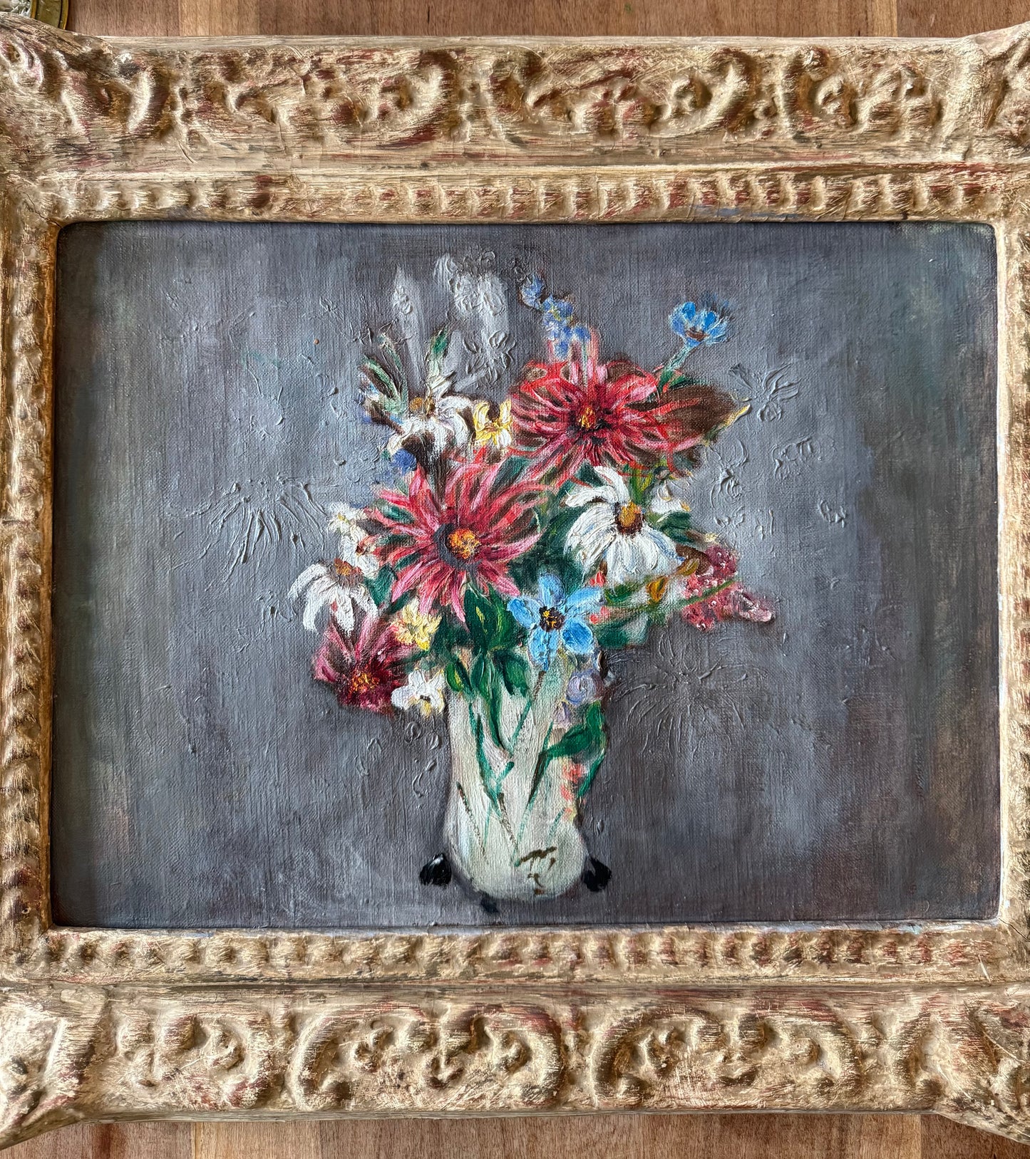 Framed flowers in vase