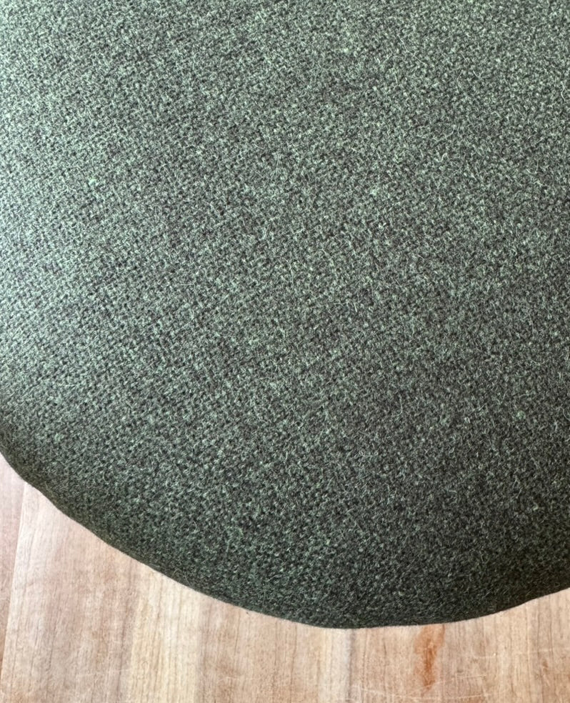 Upholstered green footstool